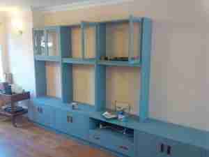 Furniture Painter paints wooden furniture